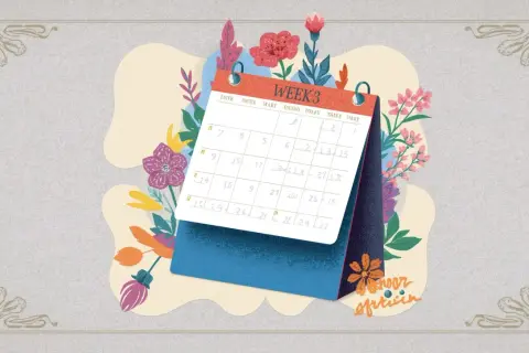 Calendario de escritorio con flores y la palabra "WEEK 3" escrita.