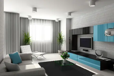 Nowoczesny szary salon. Jasne ściany, szara sofa, biały fotel i turkusowe dodatki tworzą stylowe wnętrze.