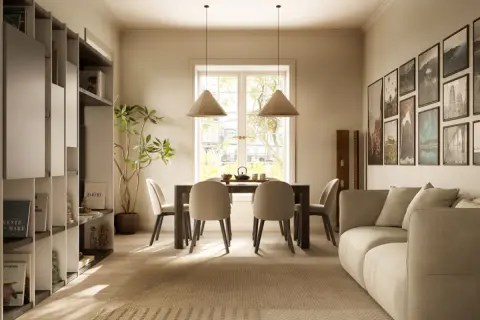 Un soggiorno con un tavolo da pranzo in stile japandi, sedie color crema, una libreria e un divano accogliente.