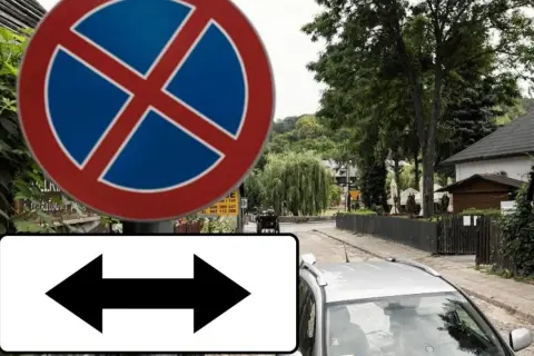 Znak zakazu zatrzymywania się z tabliczką wskazującą, że zakaz obowiązuje po obu stronach drogi.