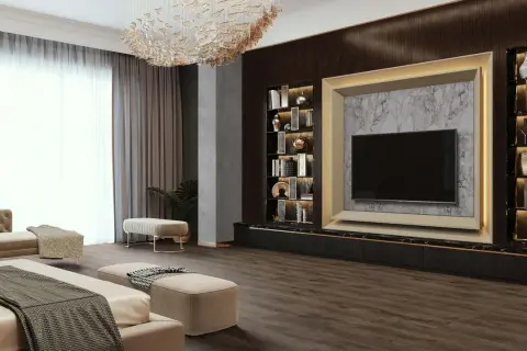 Elegancja i luksus w sypialni glamour inspiracje: złota rama TV, marmur, ciemne drewno, designerska lampa i wygodne meble.