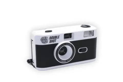A white and black half frame camera with "DOUBLE FILM SHOT" text.