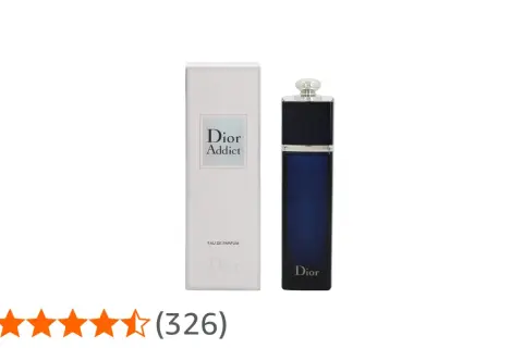 Elegancki flakon Dior Addict EDP w granatowym kolorze obok swojego białego opakowania.
