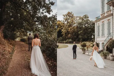 Brautpaar im first look shooting. Sie nähern sich einander auf einem Weg vor einem Schloss.
