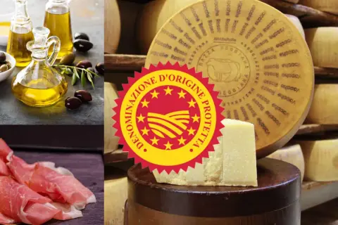 Olivenöl, Prosciutto und Parmesankäse mit DOP-Siegel. DOP Bedeutung: geschützte Ursprungsbezeichnung für Qualitätsprodukte.