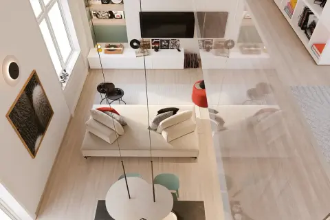 Un angolo di casa moderno e accogliente, perfetto per arredare con stile. Divano bianco, tavolino nero, quadri e giradischi creano un'atmosfera unica.