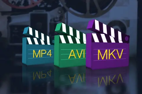 Three clapperboards labeled MP4, AVI, and MKV stand in a row, reflecting on a dark surface.