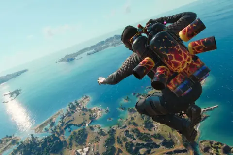 Gracz z plecakiem odrzutowym spada nad tropikalną wyspą. To ujęcie z gry Far Cry 6 poradnik.