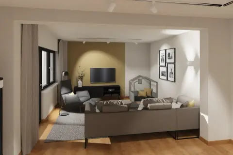 Moderne wohnzimmer anordnung mit grauem Sofa, Sessel, TV und Bilderwand. Ein gemütlicher Rückzugsort.