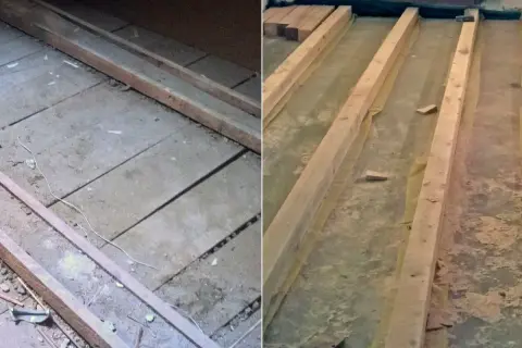 Drewniane belki na starej podłodze, być może z resztkami eternitu. Remont trwa.