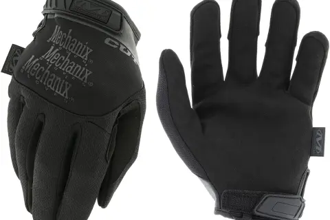 Un par de guantes anticorte Mechanix negros, listos para proteger tus manos en cualquier tarea.