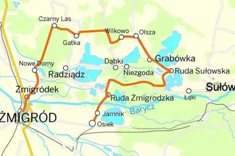 Mapa turystyczna z zaznaczoną trasą przez Stawy Milickie, łączącą miejscowości takie jak Żmigród, Czarny Las, Grabówka i Sułów.