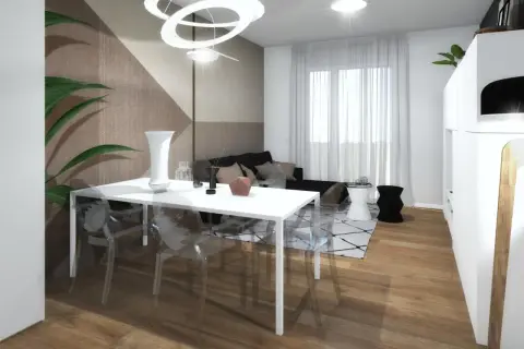 La parete dietro tavolo da pranzo presenta un motivo geometrico in tonalità neutre.