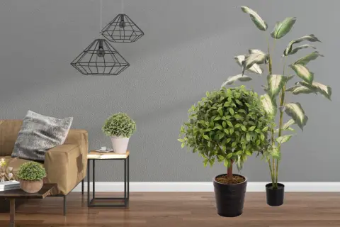 Eleganckie sztuczne kwiaty doniczkowe dodają życia nowoczesnemu salonowi z brązową kanapą i geometrycznymi lampami.