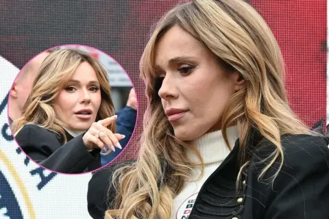 Znana polska piosenkarka z burzą blond włosów, w białym golfie i czarnej marynarce, zastanawia się, dlaczego przestała obserwować męża na Instagramie.