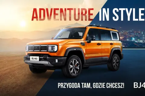 Pomarańczowy BJ40 na tle gór i miasta. "Adventure in Style" i "Przygodę tam, gdzie chcesz!". Sprawdź baic bj40 cena.