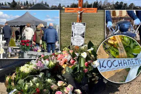 Cmentarz z namiotem pogrzebowym, krzyżem, wieńcami i zniczami.