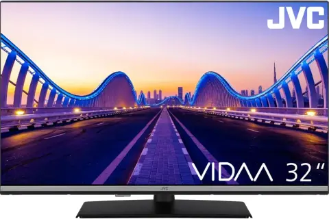 Telewizor JVC 32" VIDAA z instrukcją obsługi, wyświetlający nocny widok na futurystyczny most z niebieskimi światłami.