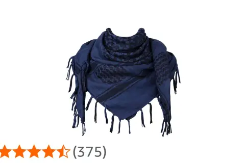 Pañuelo shemagh azul marino con flecos y estampado geométrico en negro.