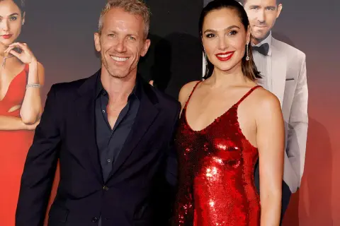 Gal Gadot w czerwonej sukni obok męża, Yaron Varsano, na premierze filmu.