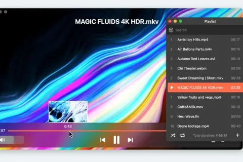 VLC media player shows "MAGIC FLUIDS 4K HDR.mkv" playing, with a playlist visible.