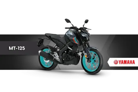 Szary motocykl Yamaha MT-125 z turkusowymi felgami, idealny na pierwsze **a1 prawo jazdy**.