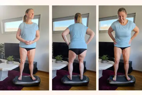 Kvinna på vibrationsplatta. Vissa menar att vibrationsplatta farligt, men hon verkar njuta av träningen.