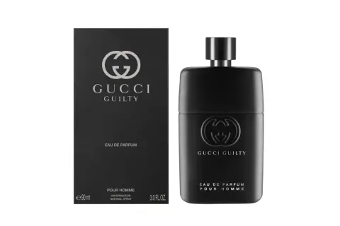Czarny flakon i opakowanie Gucci Guilty Black dla mężczyzn, z wytłoczonym logo i napisem.