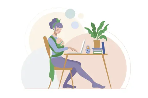 Kobieta z dzieckiem w chuście pracuje przy laptopie przy biurku.
