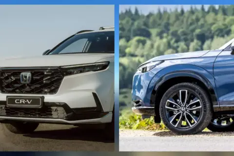 Dwa modele honda suv: biały CR-V i niebieski HR-V na tle krajobrazu.