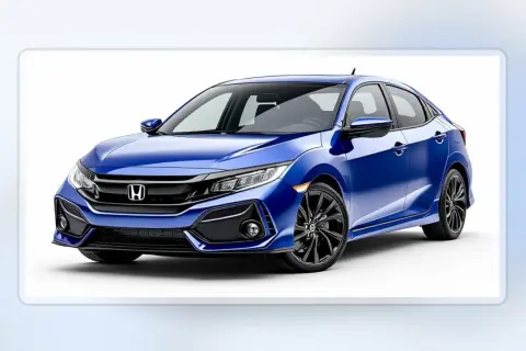 Niebieski Honda Civic sedan z czarnymi felgami, prezentujący sportowy design i nowoczesne linie.