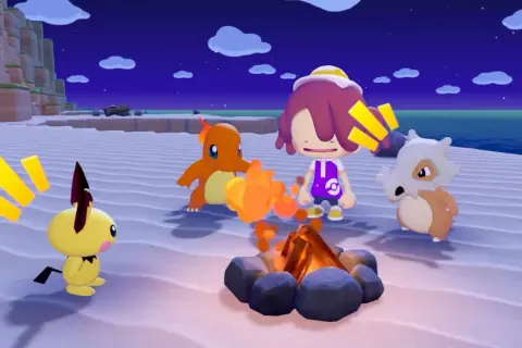 Pikachu, Charmander i Cubone przy ognisku na plaży. W tle nocne niebo i klify. To scena z gry Pokemon.