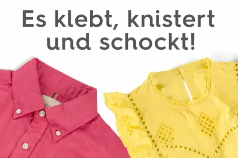 Zwei Kleidungsstücke, eine pinke Hemdbluse und ein gelbes Oberteil mit Lochstickerei, scheinen statisch aufgeladen zu sein und kleben, knittern und schocken.
