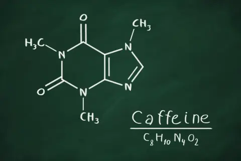 Struktura chemiczna kofeiny, wyjaśniająca, jak kofeina wpływa na organizm. Wzór C8H10N4O2.