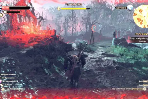 Geralt w rynsztunku szkoły żmii przemierza mroczny las. Czerwone światło otacza ruiny.