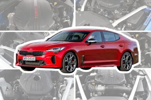 Czerwone Kia Stinger na tle silnika. Wiele osób szuka kia stinger opinie, ten model zachwyca mocą.