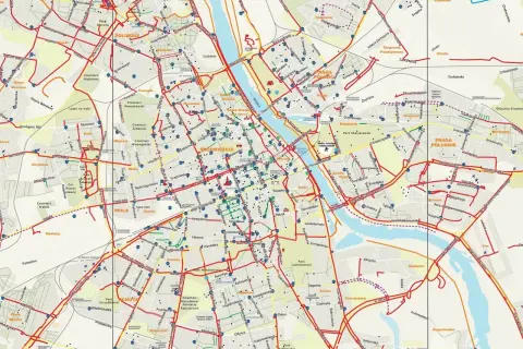 Mapa tras rowerowych Warszawy. Czerwone linie pokazują ścieżki rowerowe, a niebieskie punkty to stacje Veturilo.