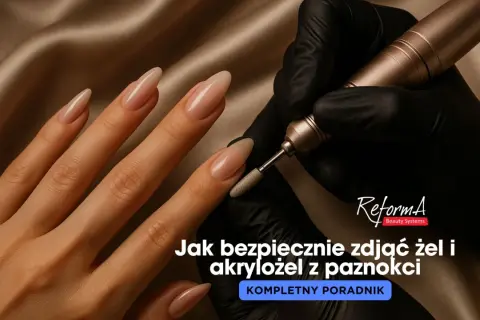 Dłoń z długimi paznokciami, na których widać proces usuwania żelu frezarką. Dowiedz się, jak zdjąć żel z paznokci w domu bez acetonu.