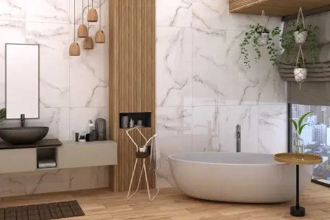 Nowoczesna łazienka z wanną i umywalką. Marmurowe płytki sięgają do samej góry, tworząc elegancką przestrzeń.