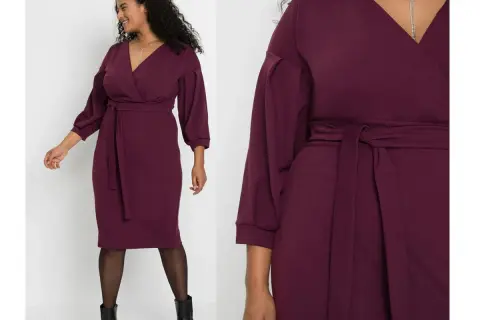 Elegancka sukienka świąteczna plus size w kolorze śliwkowym, z dekoltem V i wiązaniem w talii. Idealna na świąteczne okazje.