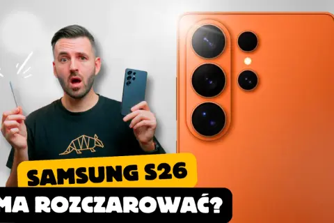 Zaskoczony mężczyzna trzymający rysik obok pomarańczowego Samsung Galaxy S26. Czy nowy model rozczaruje?