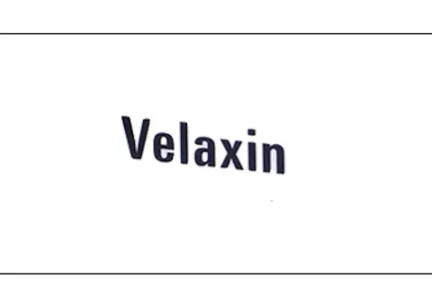 Napis "Velaxin" na białym tle.