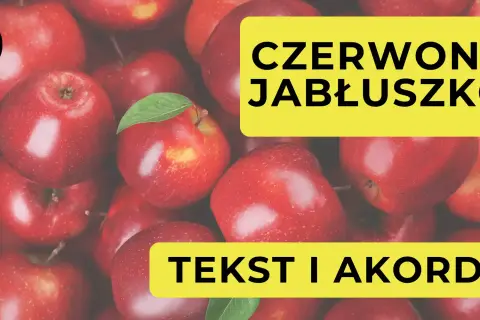 Czerwone jabłuszko, tekst i akordy. W tle mnóstwo soczystych jabłek.