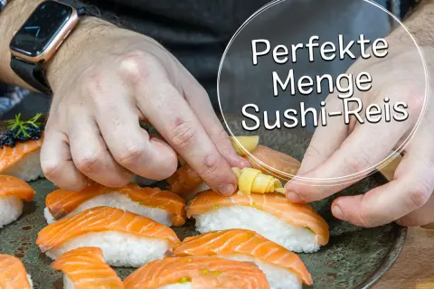 Hände arrangieren Sushi mit Lachs. Die perfekte Menge Sushi-Reis pro Person ist entscheidend für den Genuss.