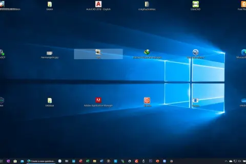 Pulpit Windows 11 z ikonami. Dowiedz się, jak zmniejszyć ikony na pulpicie Windows 11, aby uzyskać bardziej uporządkowany wygląd.