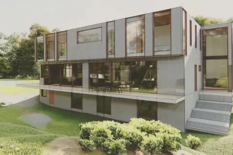 Modern architect's home in the ravine, featuring glass walls and cantilevered levels, nestled amongst lush greenery.