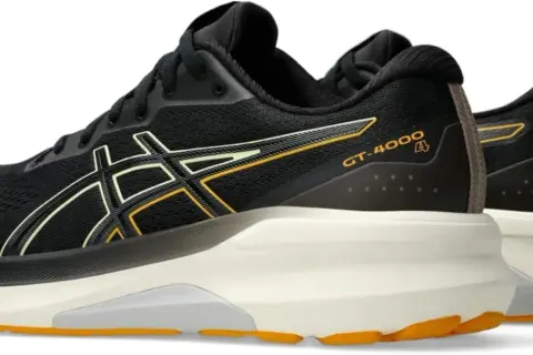 Czarne buty sportowe Asics GT-4000 z żółtymi i jasnożółtymi detalami, idealne do biegania.