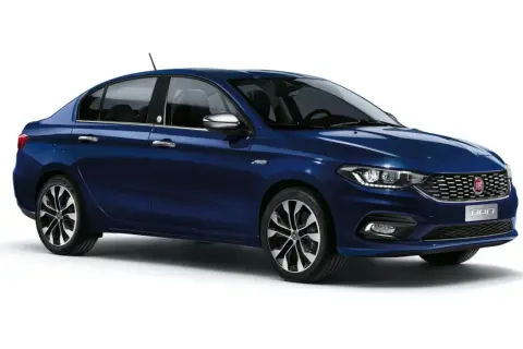 Elegancki, granatowy fiat tipo sedan z chromowanymi detalami i felgami. Idealny do miasta i na dalsze trasy.