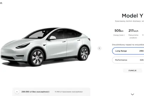 Biały Tesla Model Y Long Range, którego cena to 299.990 zł, z zasięgiem 505 km.