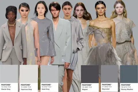 Modelle con abiti in varie tonalità di grigio, dal chiaro al grigio antracite scuro.